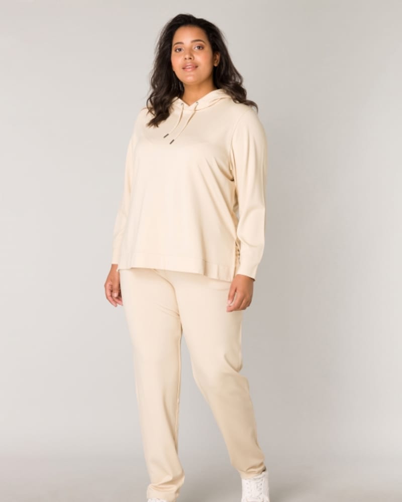 Front of a model wearing a size X-0(44) Yalisa in Light Beige by Base Level Curvy. | dia_product_style_image_id:253169